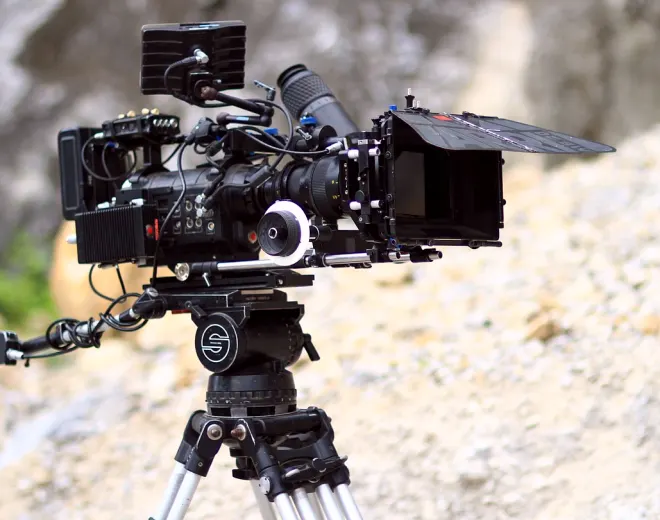 Camera on a tripod at a live position